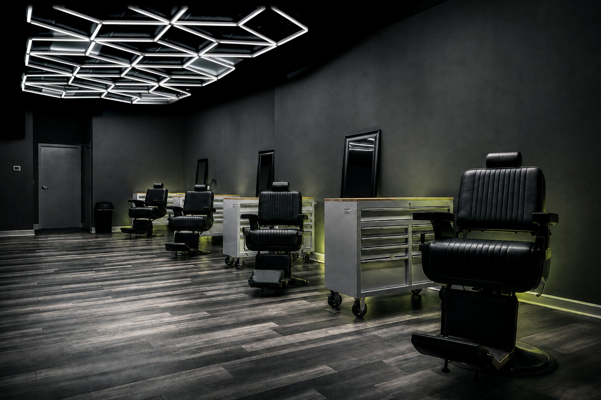 After Hours artistic treatment of FadeLab barber chairs and geometric ceiling lights