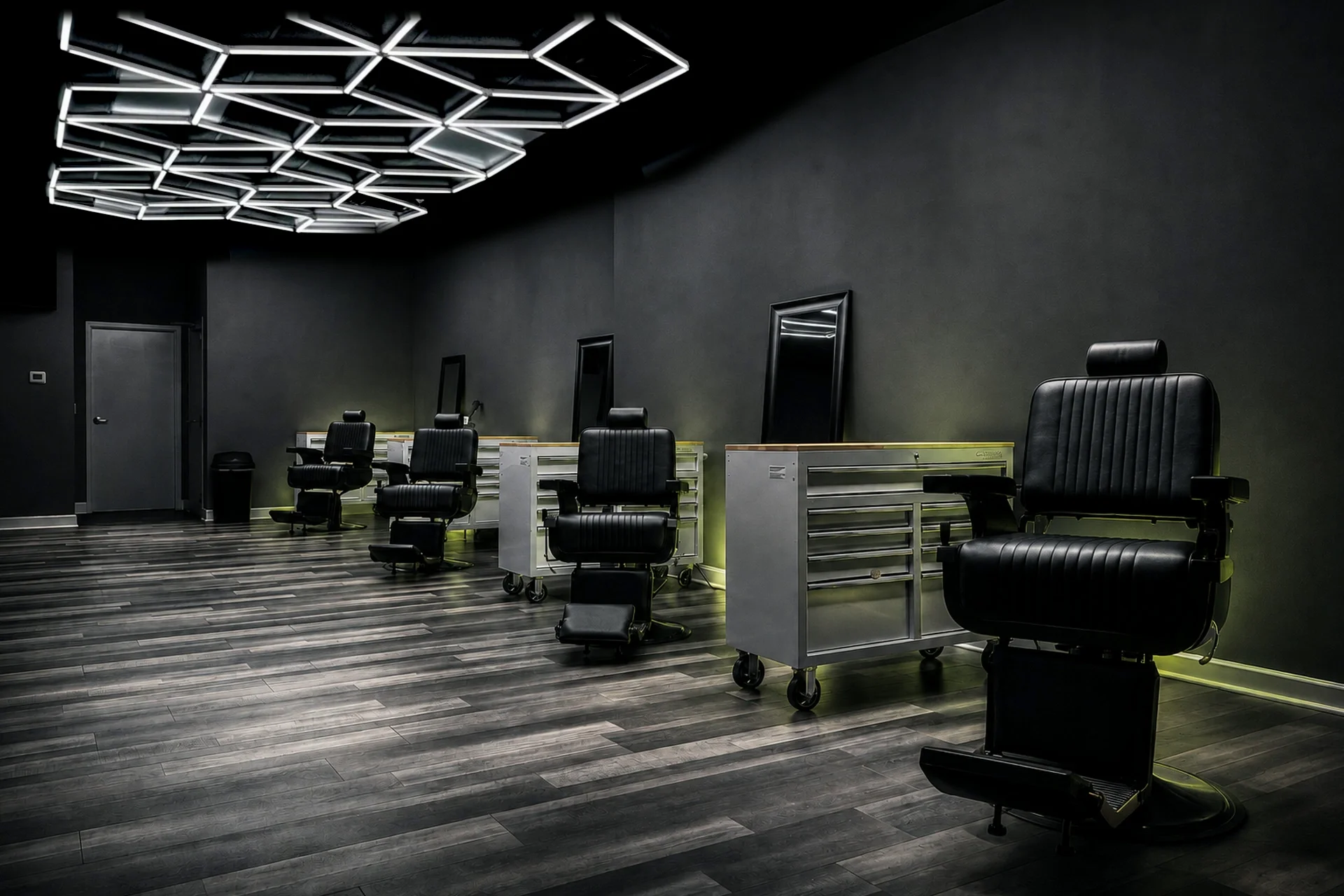 After Hours artistic treatment of FadeLab barber chairs and geometric ceiling lights